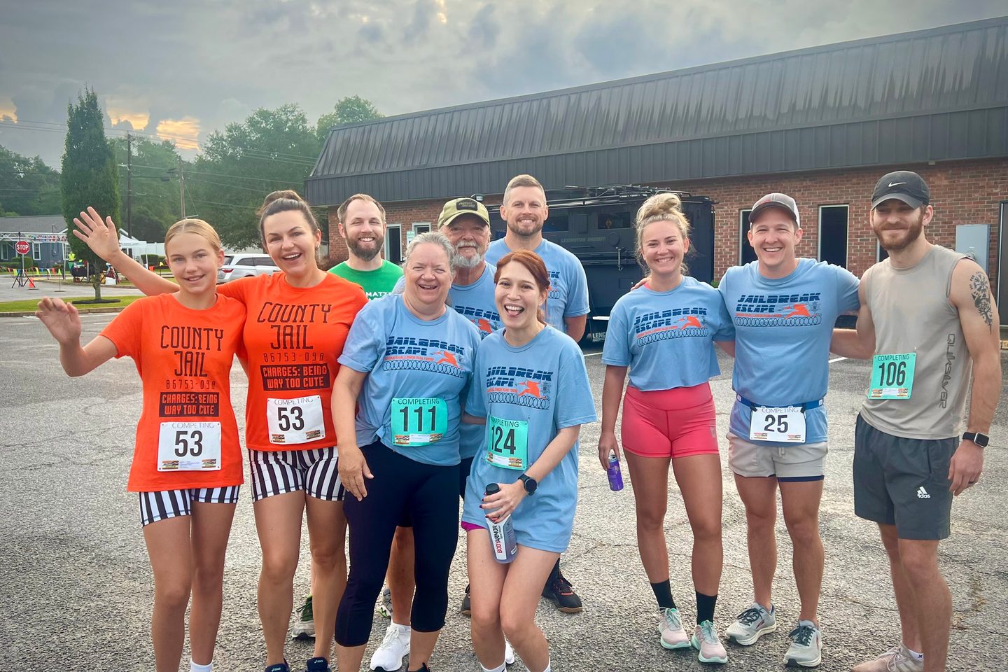 The Lodestar group together after a road race, several still wearing their numbered bibs